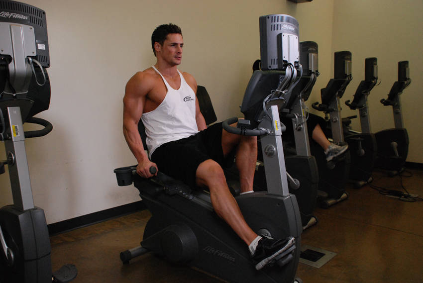 Recumbent Bike — starting position, working the quads
