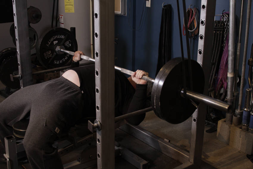 Reverse Band Bench Press — end position, working the triceps