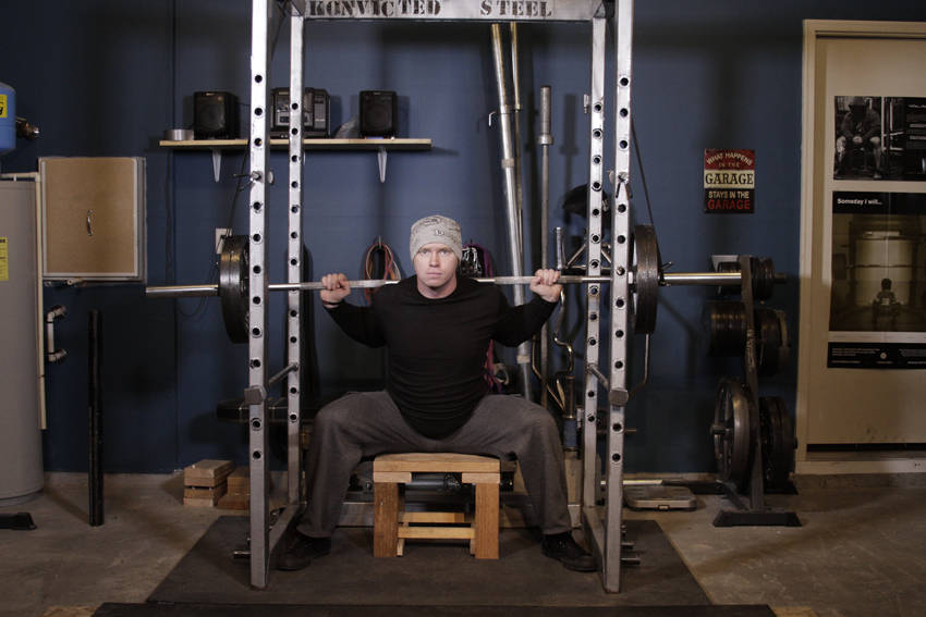 Reverse Band Box Squat — end position, working the quads