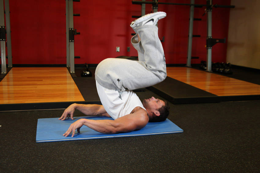 Reverse Crunch — end position, working the abs