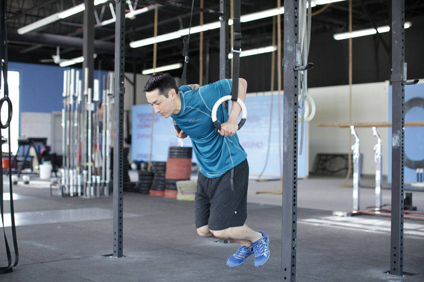 Ring Dips — starting position, working the triceps