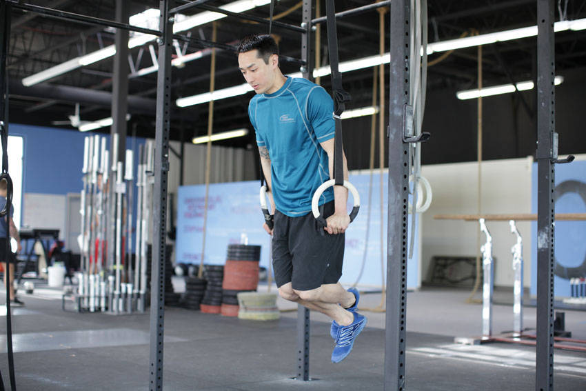 Ring Dips — end position, working the triceps