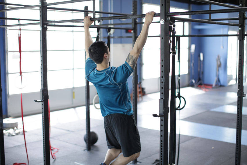 Scapular Pull-Up — end position, working the traps