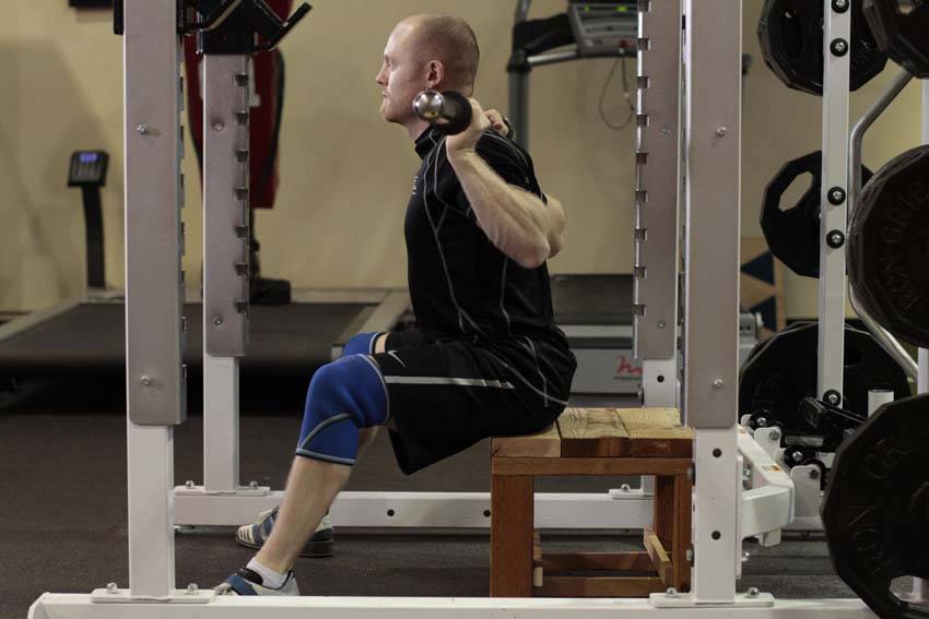 Seated Good Mornings — starting position, working the lower back