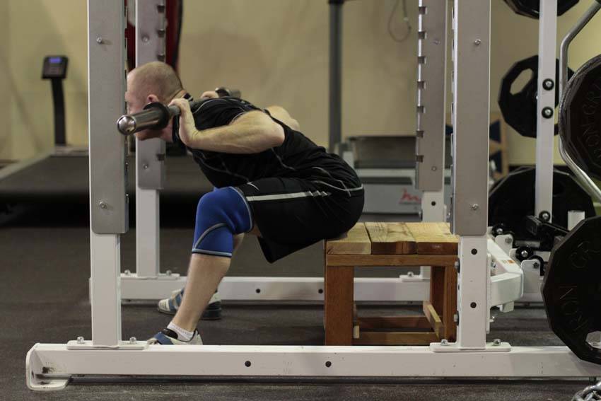 Seated Good Mornings — end position, working the lower back