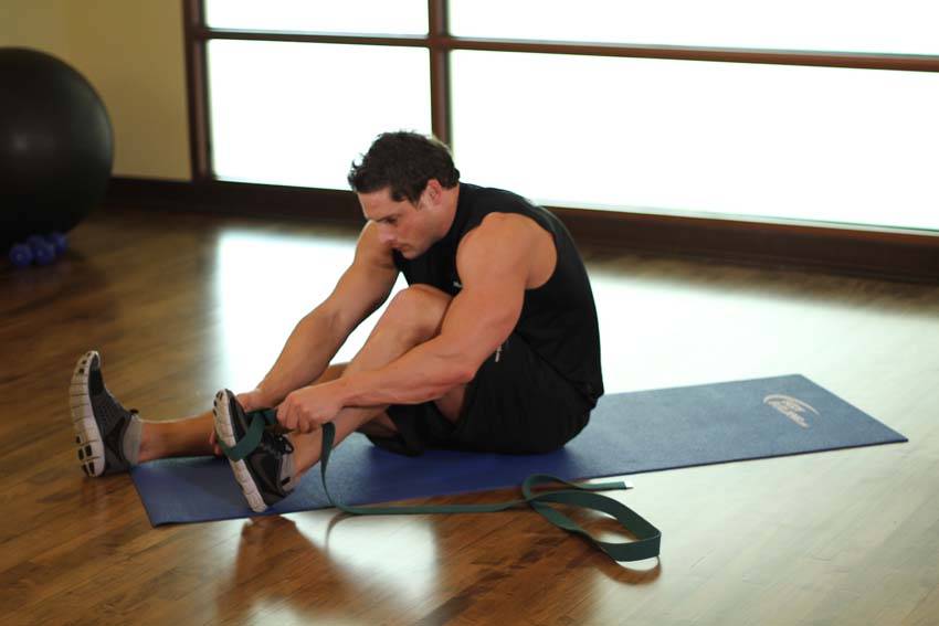 Seated Hamstring and Calf Stretch — starting position, working the hamstrings