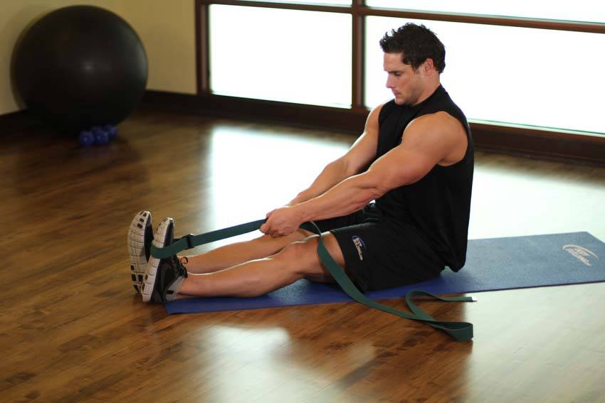Seated Hamstring and Calf Stretch — end position, working the hamstrings