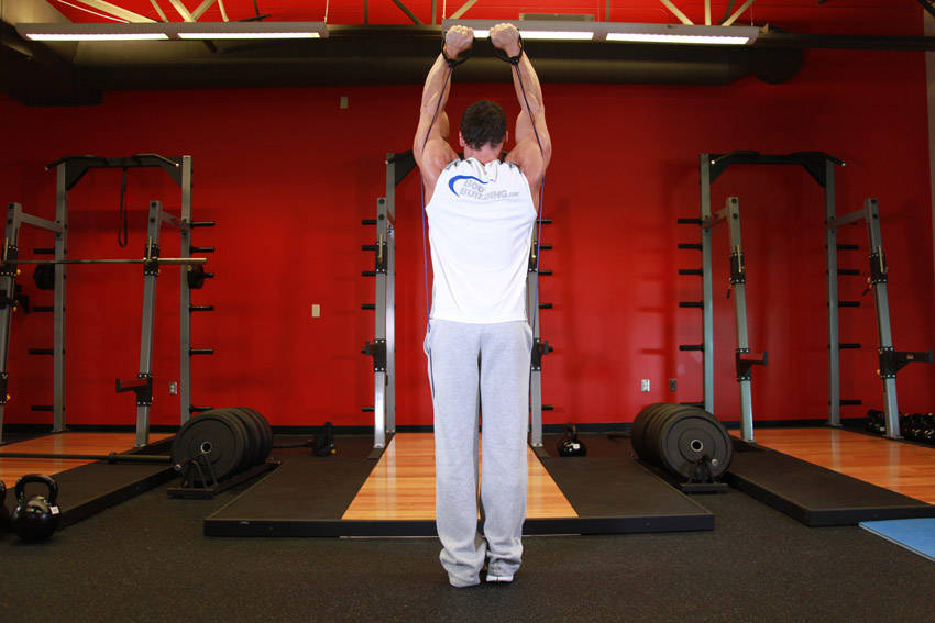 Shoulder Press - With Bands — end position, working the shoulders