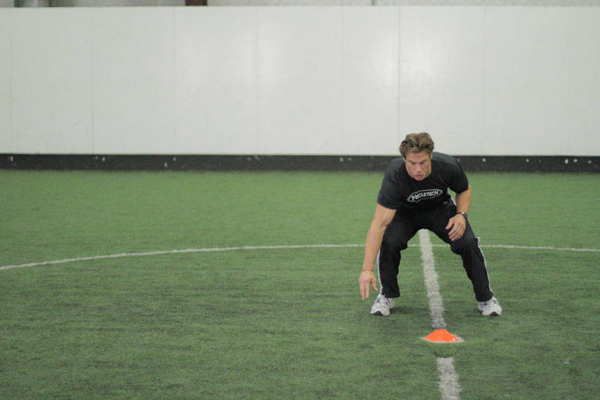 Side Standing Long Jump — starting position, working the quads
