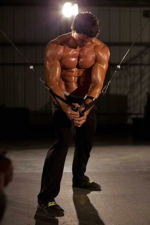 Single-Arm Cable Crossover — end position, working the chest