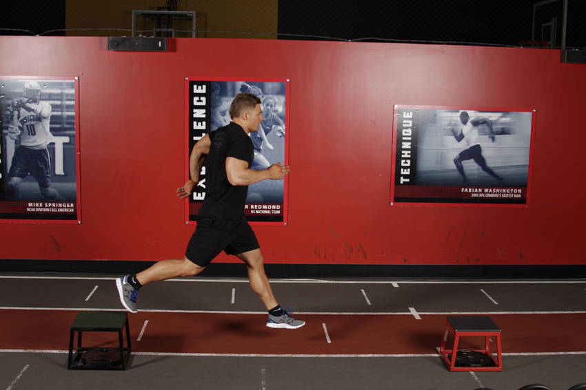 Single-Leg Stride Jump — end position, working the quads
