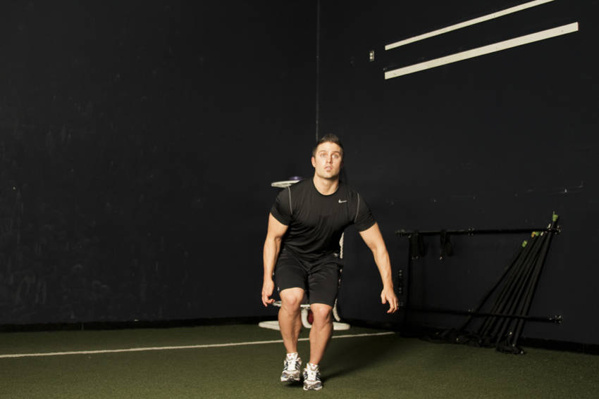 Single Leg Butt Kick — starting position, working the quads