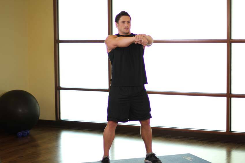 Sit Squats — starting position, working the quads