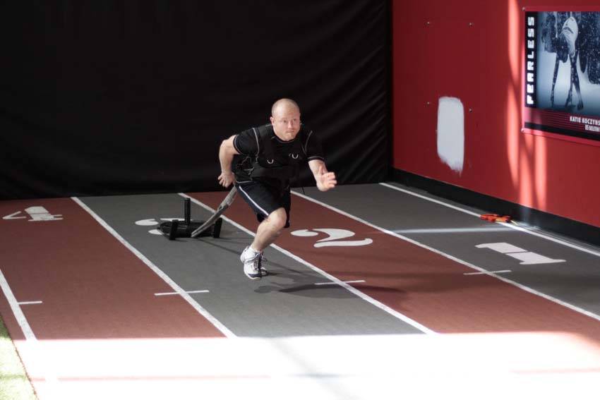 Sled Drag - Harness — starting position, working the quads