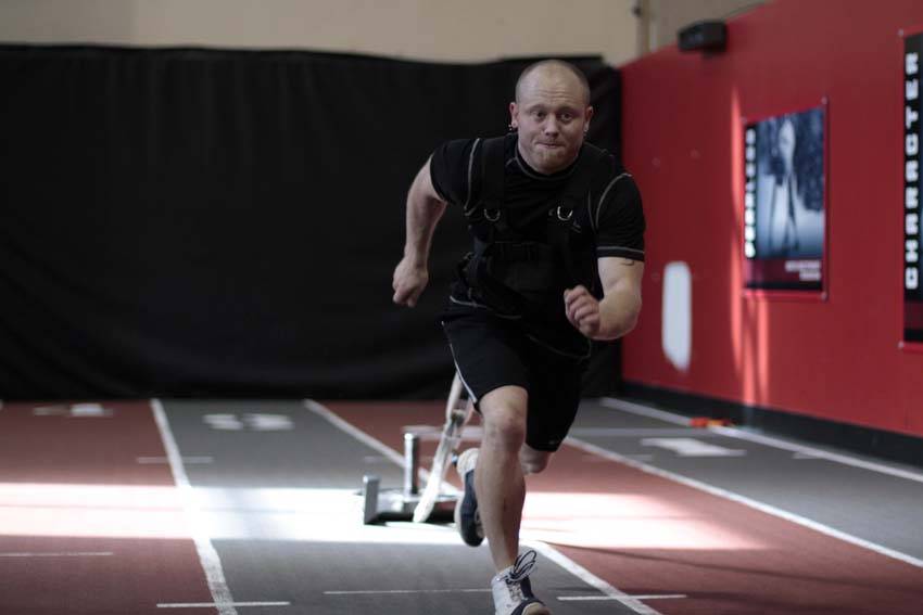 Sled Drag - Harness — end position, working the quads