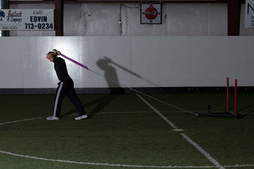 Sled Overhead Triceps Extension — starting position, working the triceps