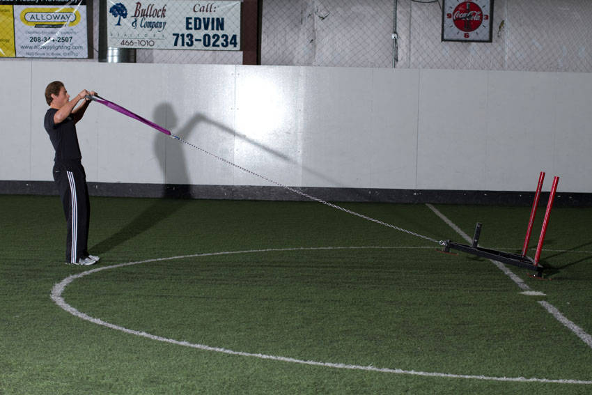 Sled Reverse Flye — end position, working the shoulders