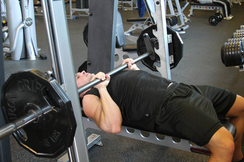 Smith Machine Close-Grip Bench Press — starting position, working the triceps