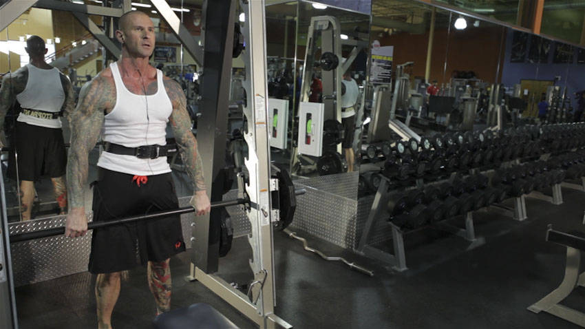 Smith Machine Hang Power Clean — starting position, working the hamstrings