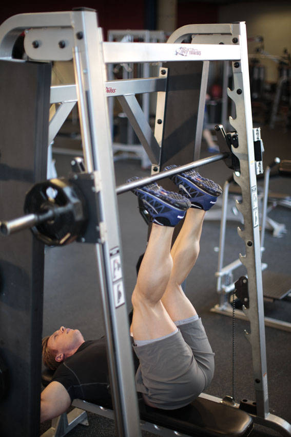 Smith Machine Hip Raise — starting position, working the abs