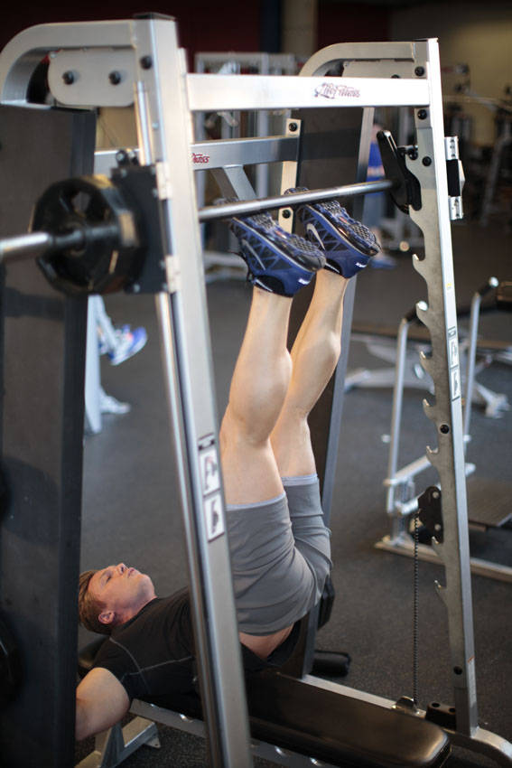 Smith Machine Hip Raise — end position, working the abs