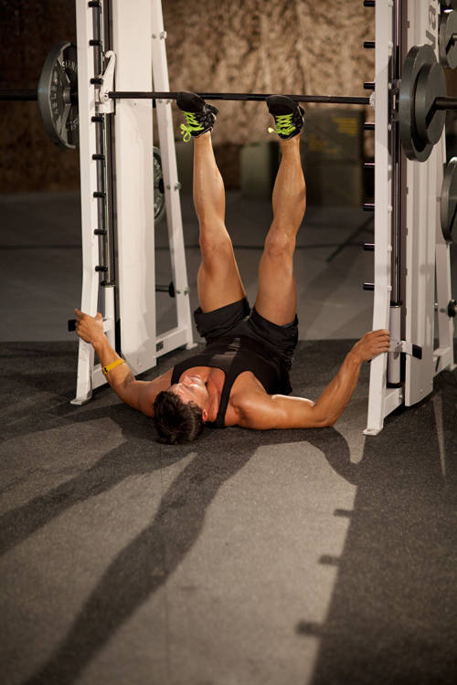 Smith Machine Leg Press — starting position, working the quads