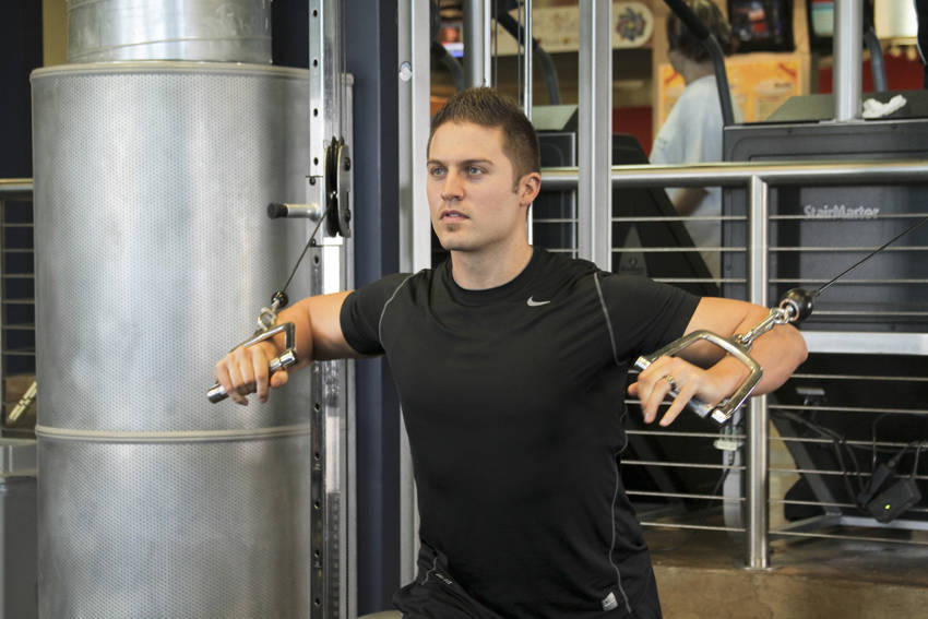 Standing Cable Chest Press — starting position, working the chest