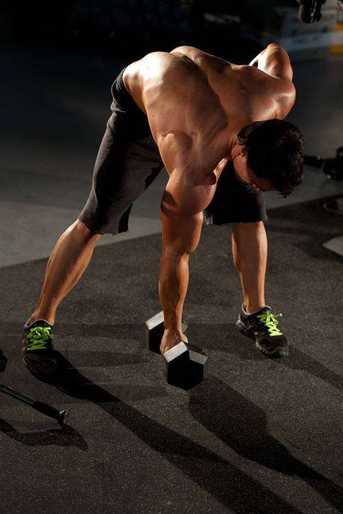 Standing Concentration Curl — starting position, working the biceps