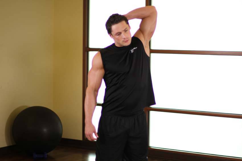 Standing Lateral Stretch — starting position, working the abs