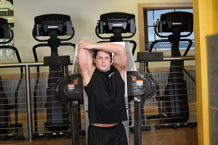 Standing Low-Pulley One-Arm Triceps Extension — starting position, working the triceps