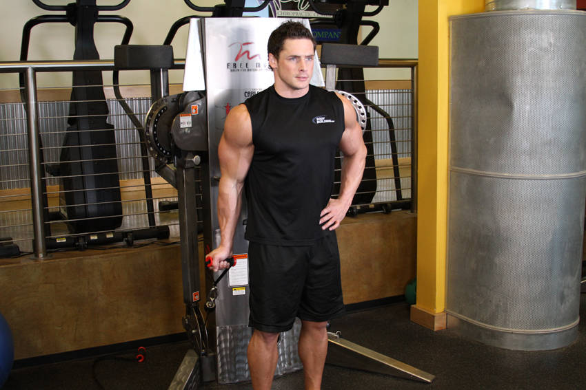 Standing One-Arm Cable Curl — starting position, working the biceps