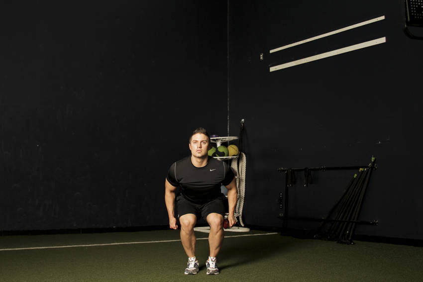 Star Jump — starting position, working the quads