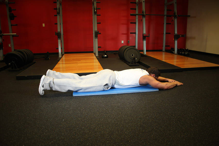 Superman — starting position, working the lower back