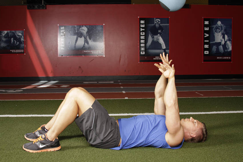 Supine Chest Throw — end position, working the triceps