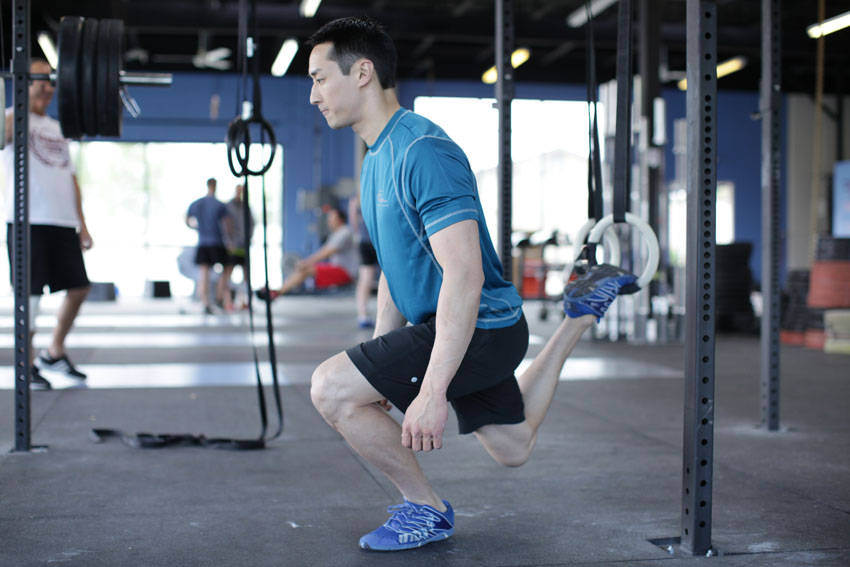 Suspended Split Squat — end position, working the quads