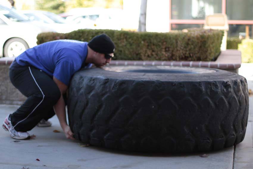 Tire Flip — starting position, working the quads
