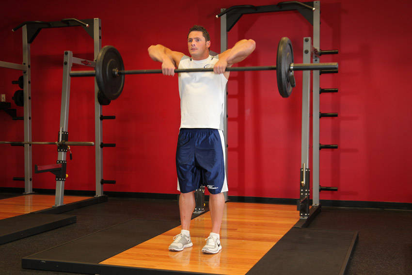 Upright Barbell Row — starting position, working the shoulders