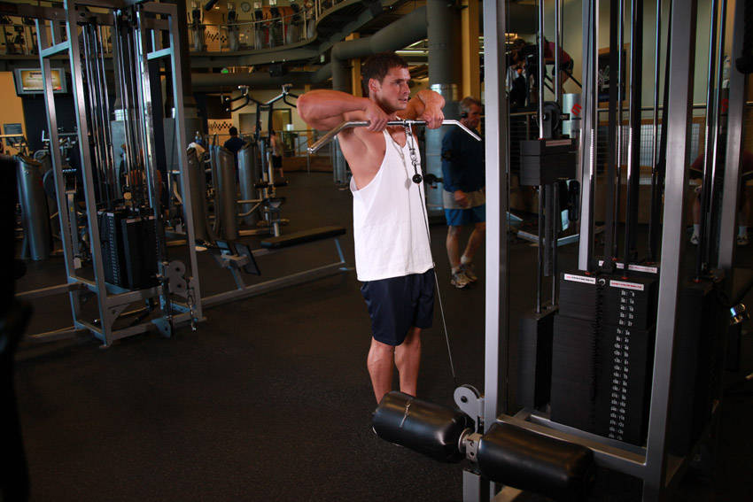 Upright Cable Row — starting position, working the traps