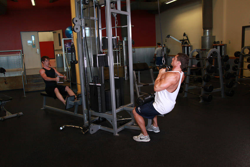 V-Bar Pulldown — starting position, working the lats