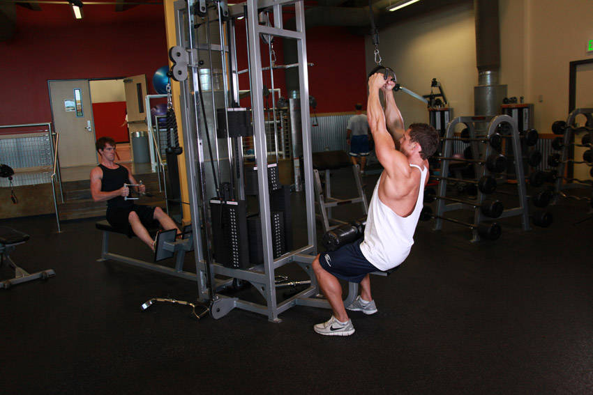 V-Bar Pulldown — end position, working the lats
