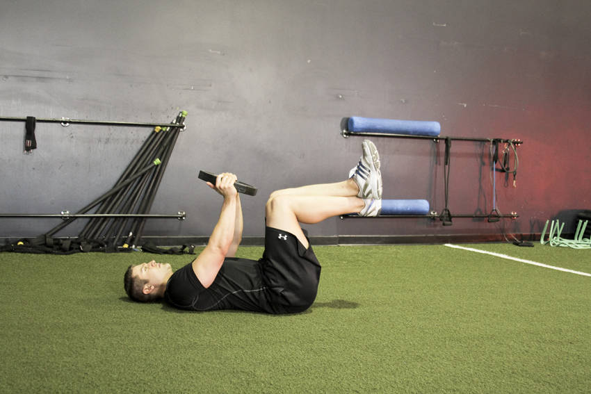Weighted Crunches — starting position, working the abs