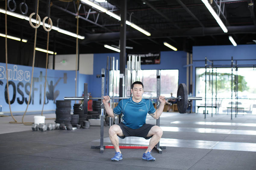 Weighted Jump Squat — end position, working the quads