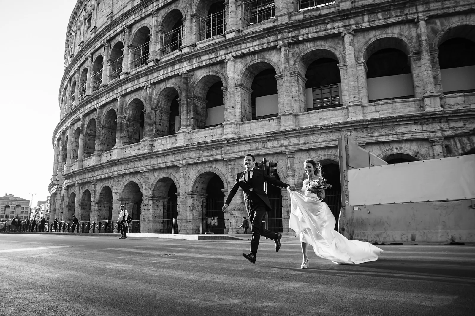 La corsa davanti al Colosseo