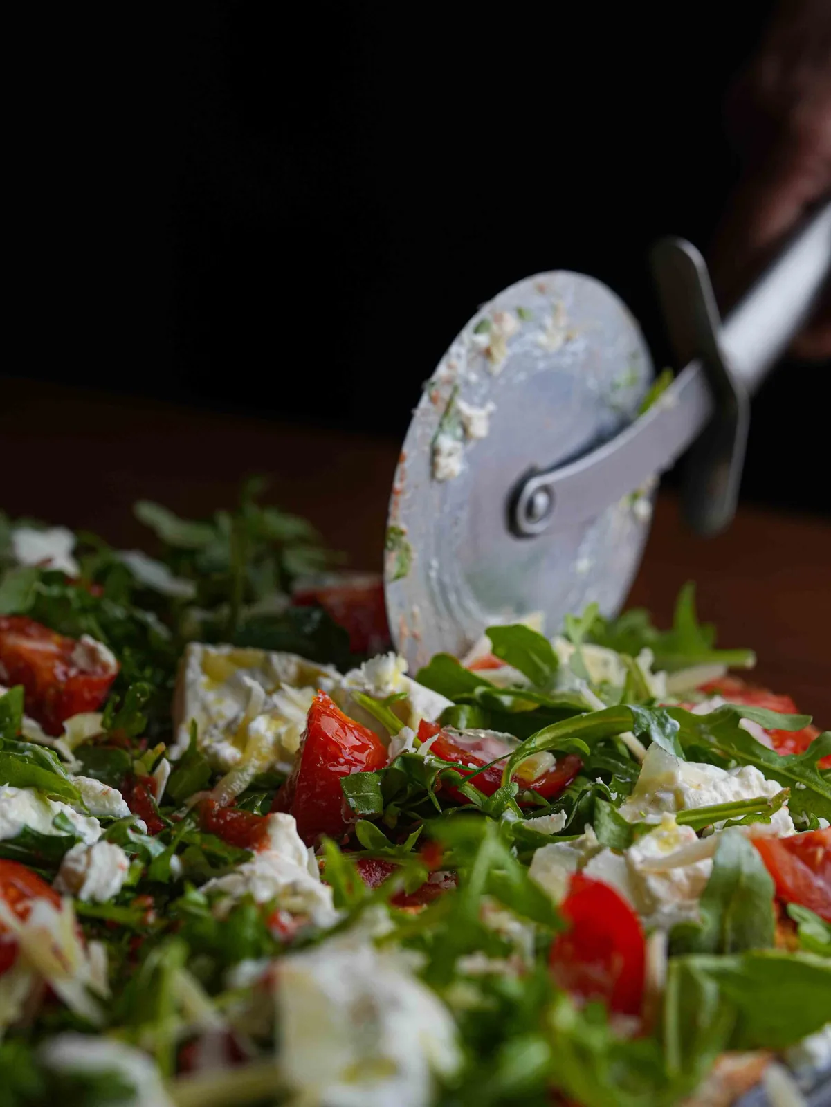 L'insalata e la rotella della pizza