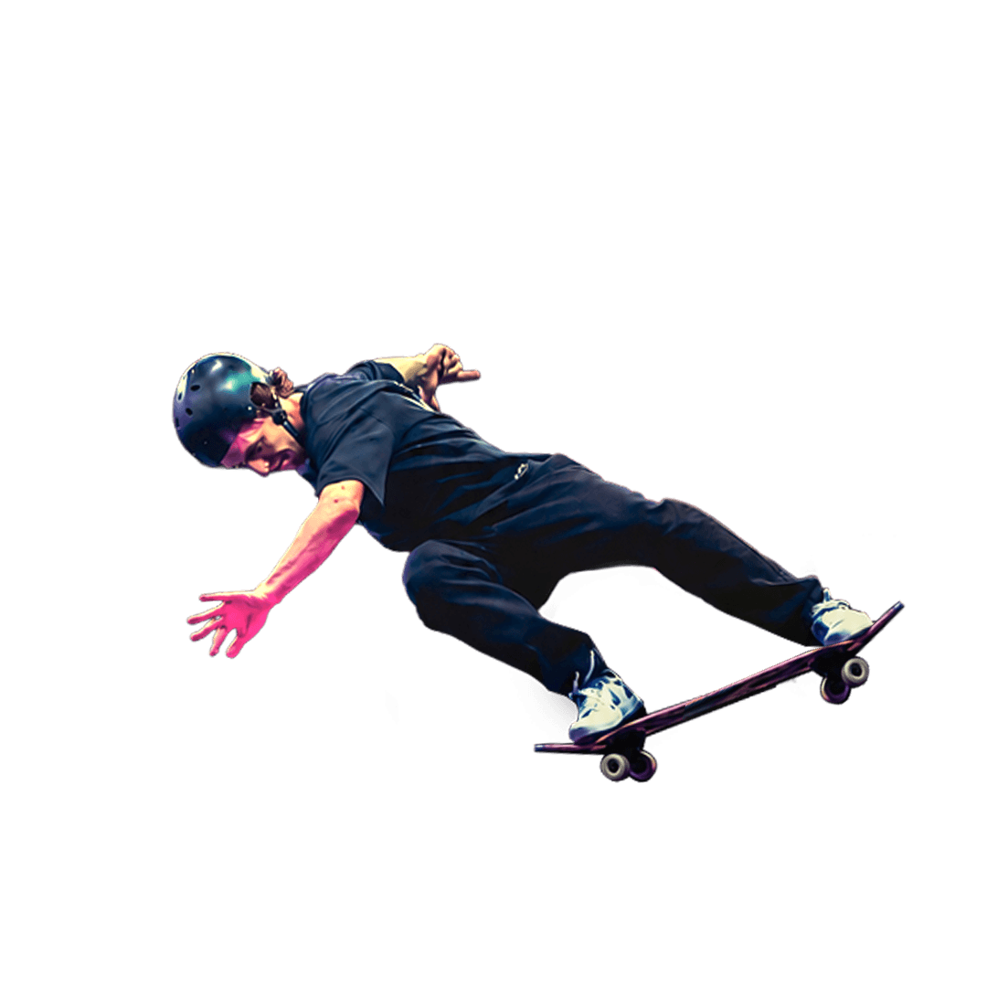 Skateboarder landing on a ramp