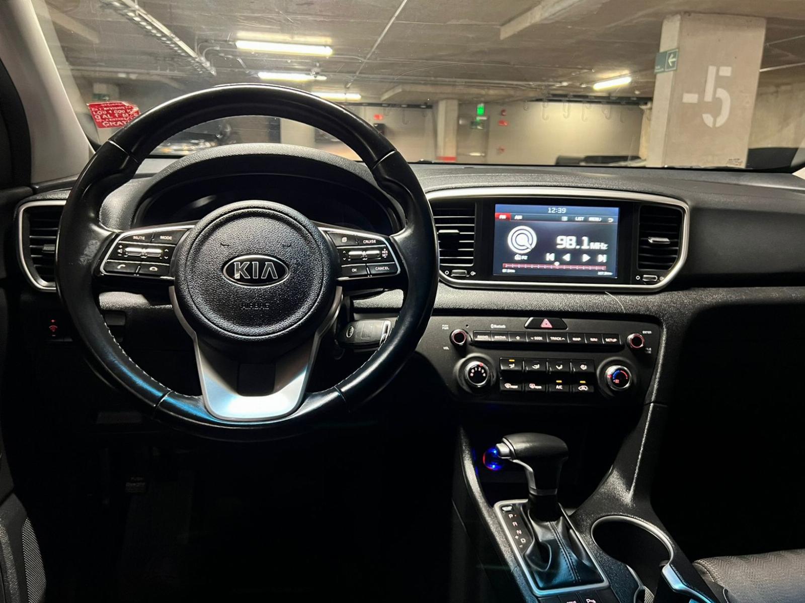 KIA Sportage — foto 12 de 17