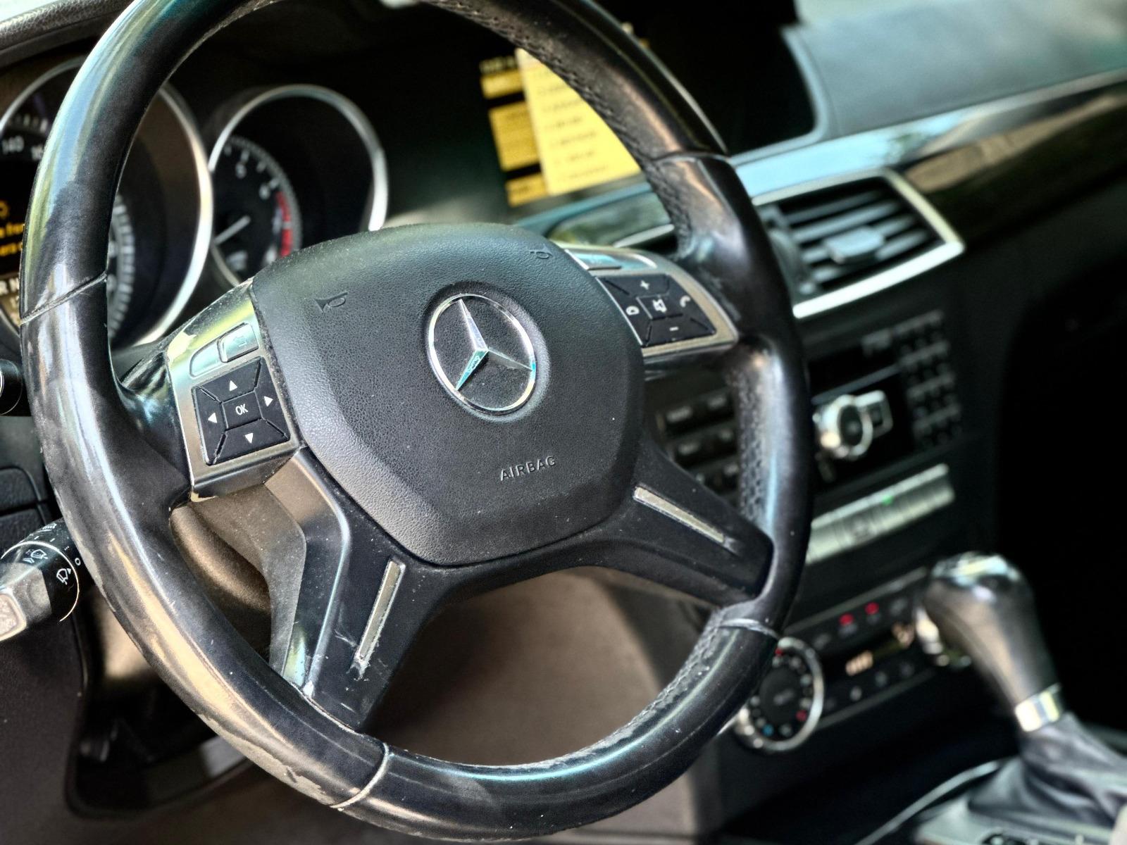 Mercedes-Benz C180 — foto 12 de 12