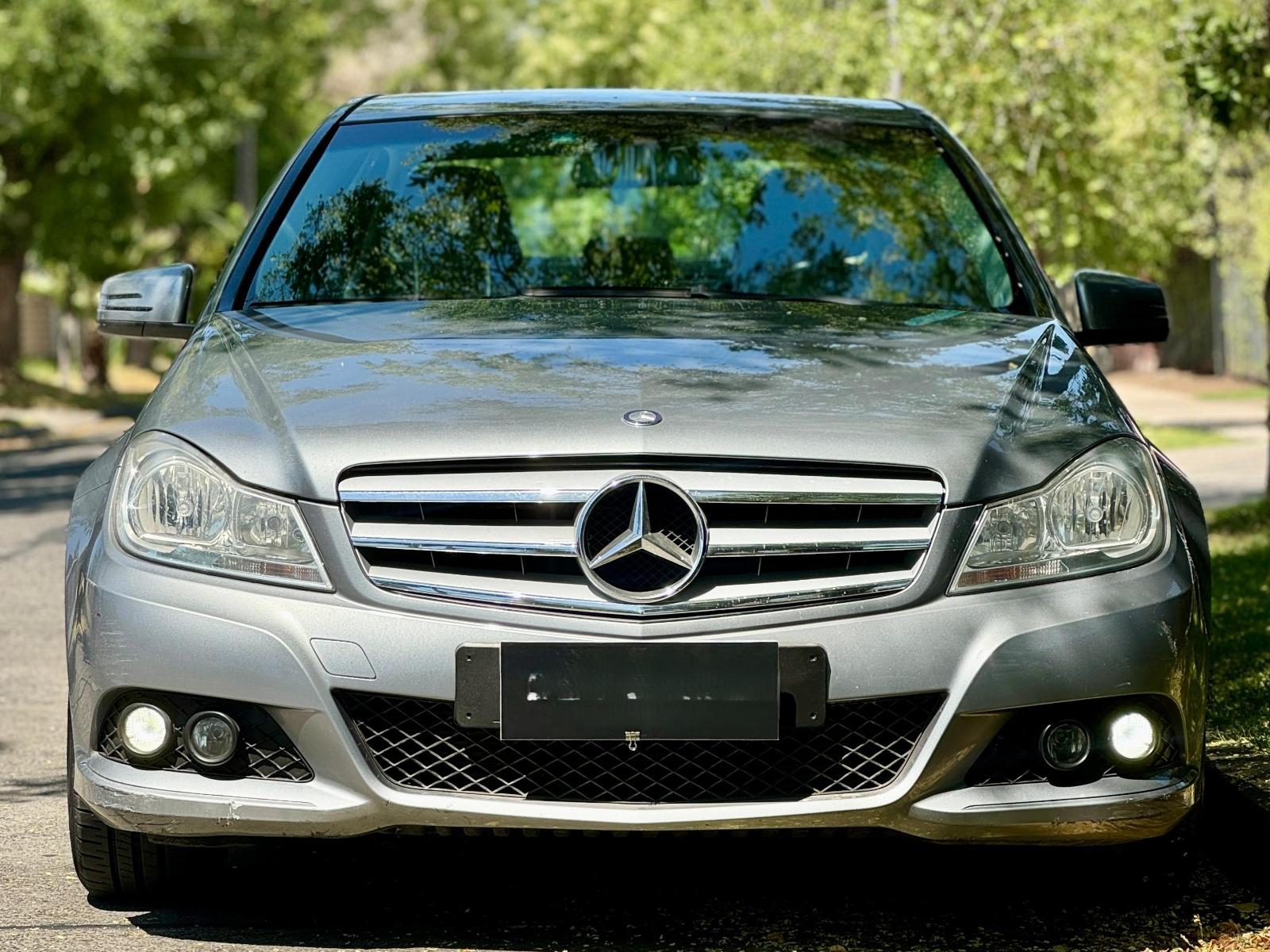 Mercedes-Benz C180 — foto 5 de 12