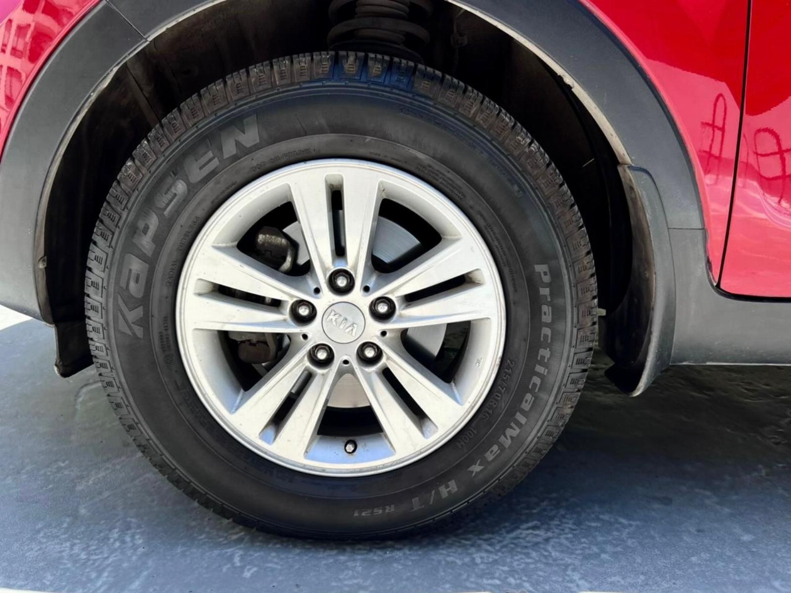 KIA Sportage — foto 13 de 16