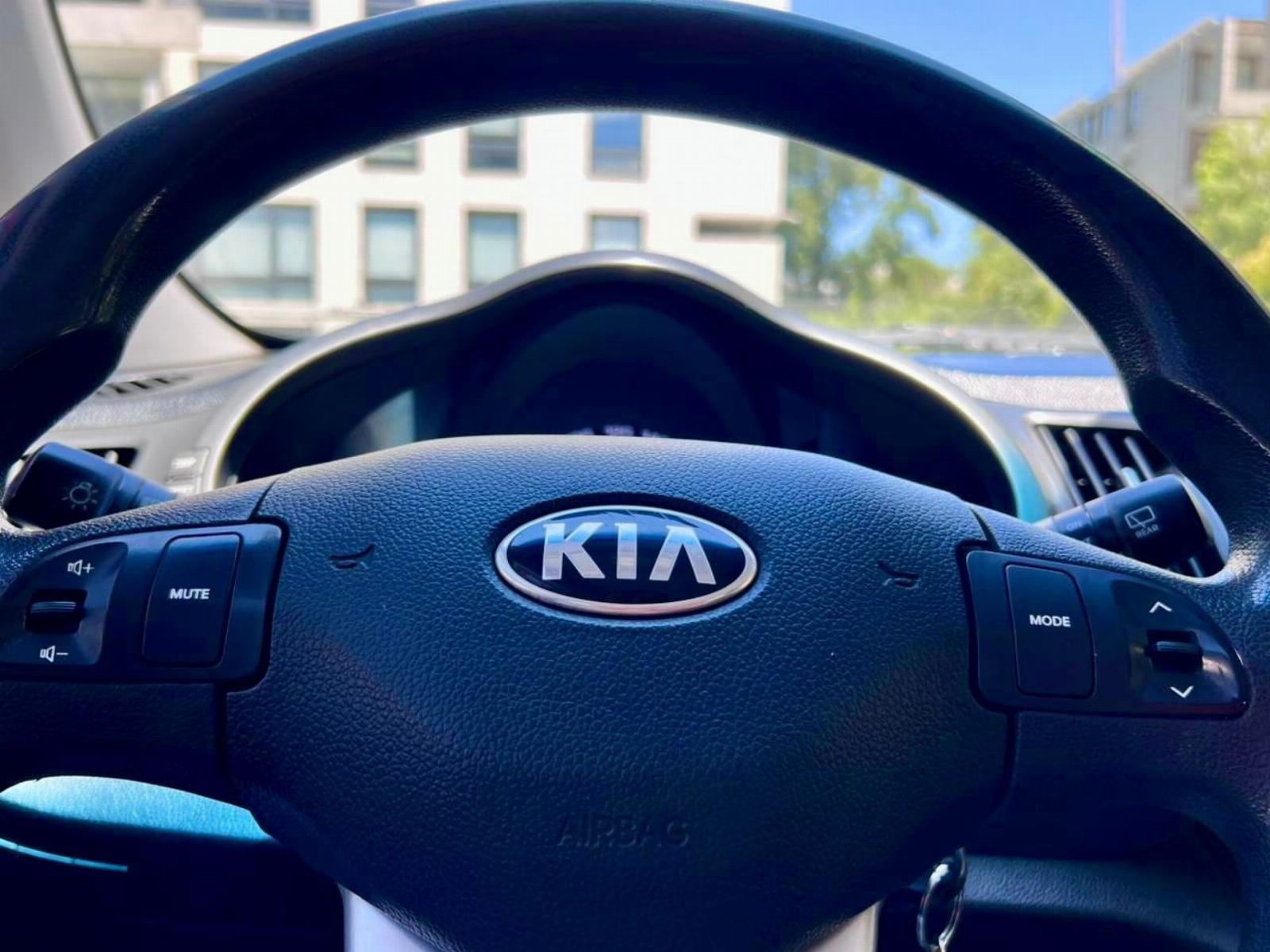 KIA Sportage — foto 11 de 16